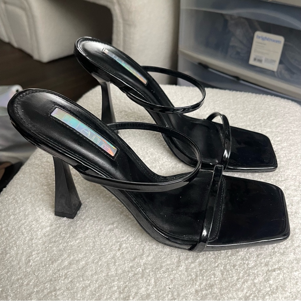Forever 21 Black Heeled Sandals with Sleek Design